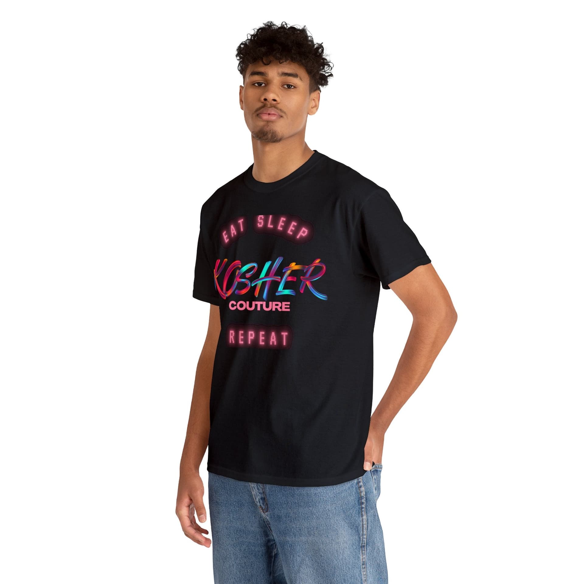 Person wearing a black t-shirt with 'Eat Sleep Kosher Couture Repeat' printed in vibrant neon-style lettering